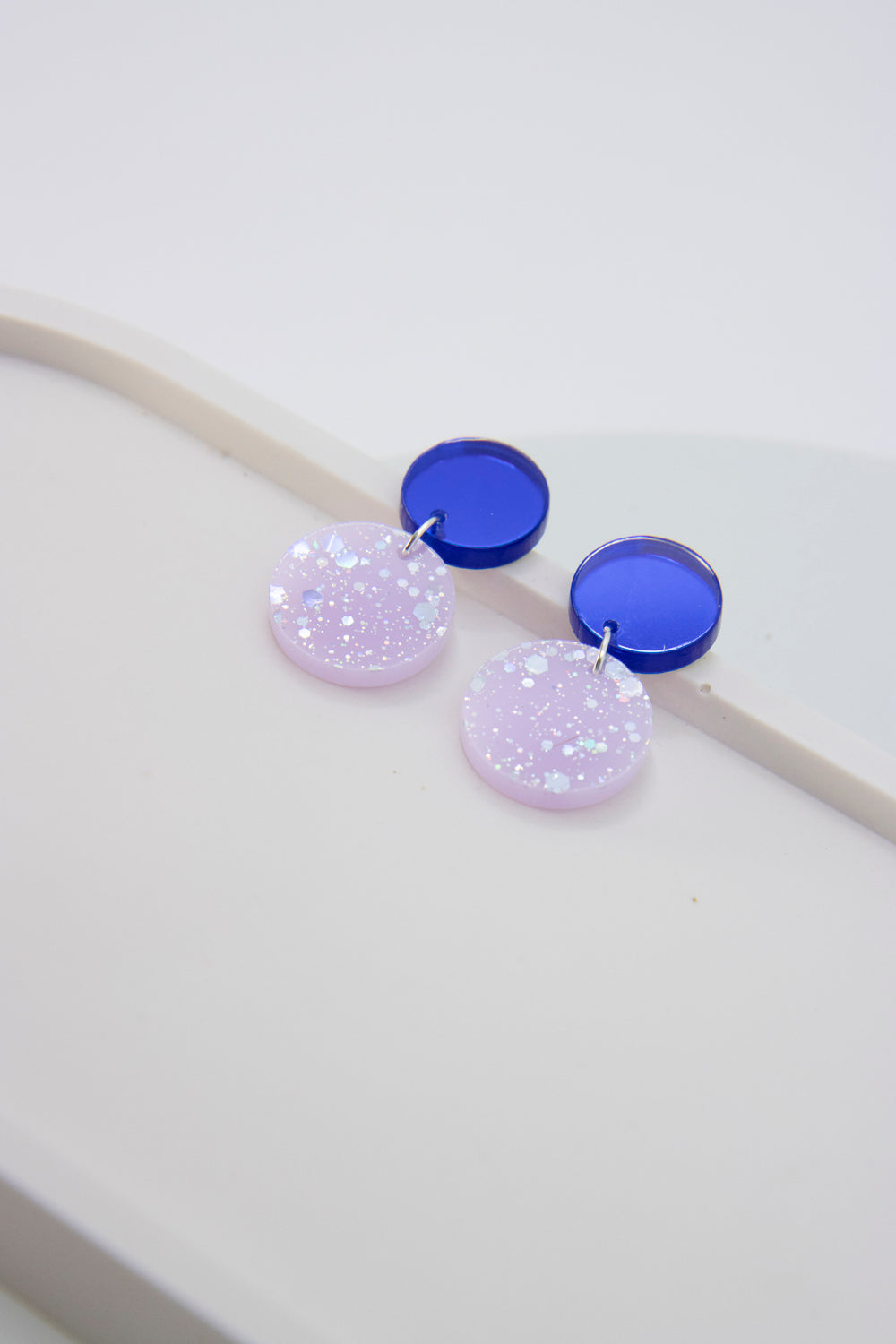Royal blue ear stud "NENA" with hologlitter