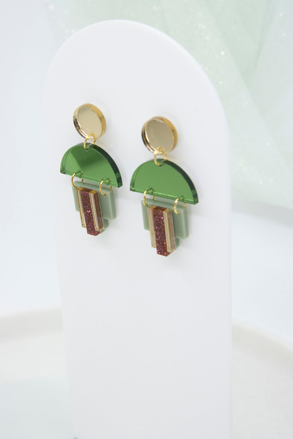 EMPIRE – Art Deco earrings in glitter green & mirror orange