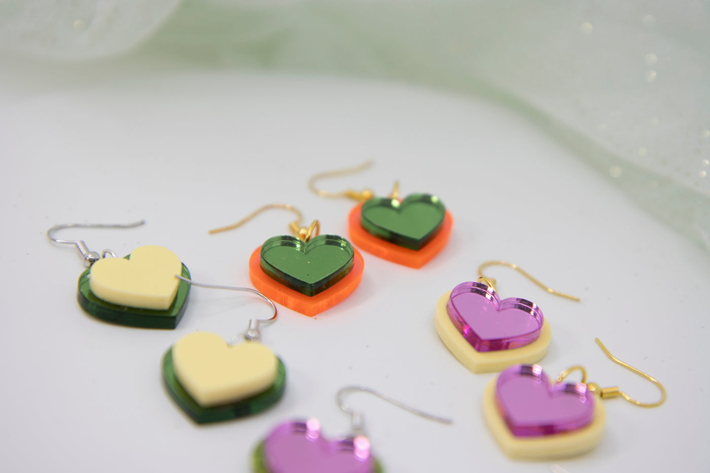 HEART DROPS earrings – neon orange and mirror green