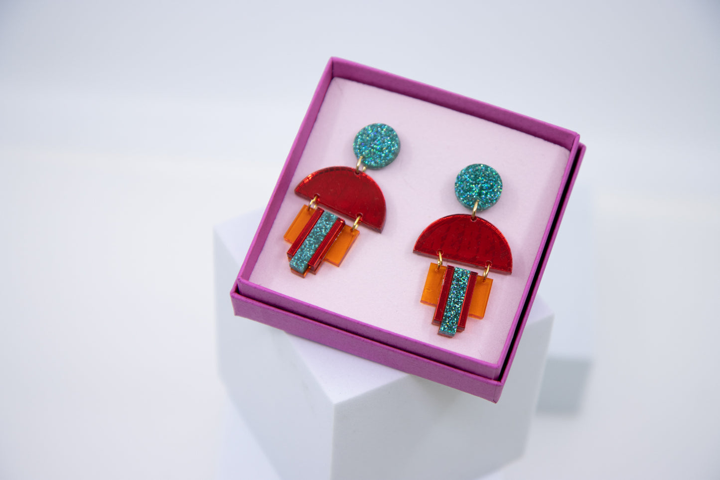 EMPIRE – Art Deco earrings in glitter green &amp; mirror orange