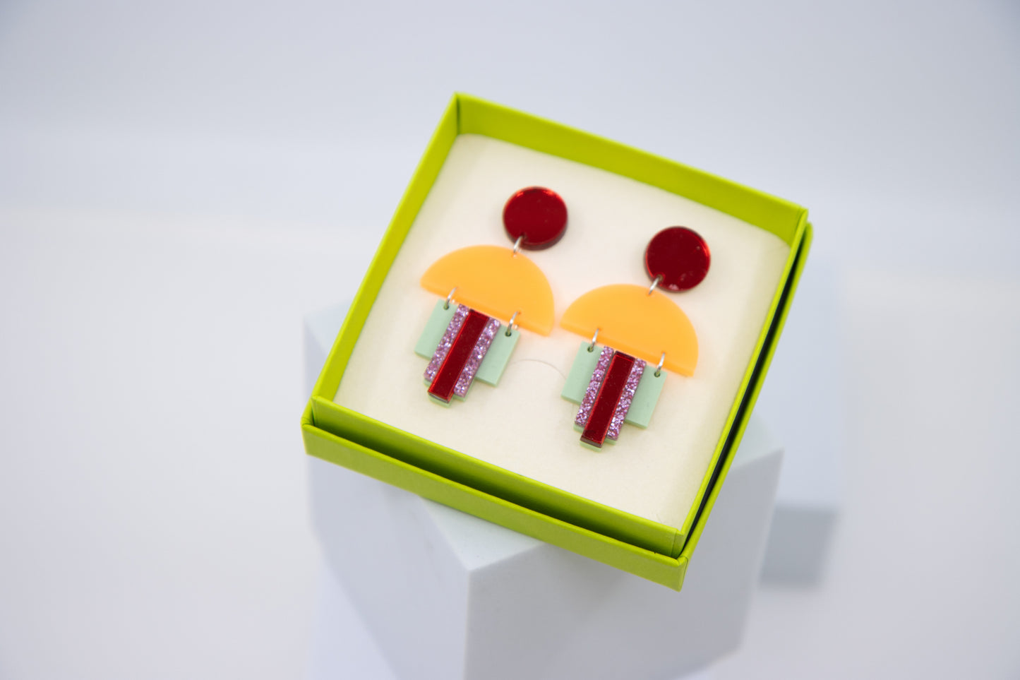 EMPIRE – Art Deco earrings in glitter green &amp; mirror orange