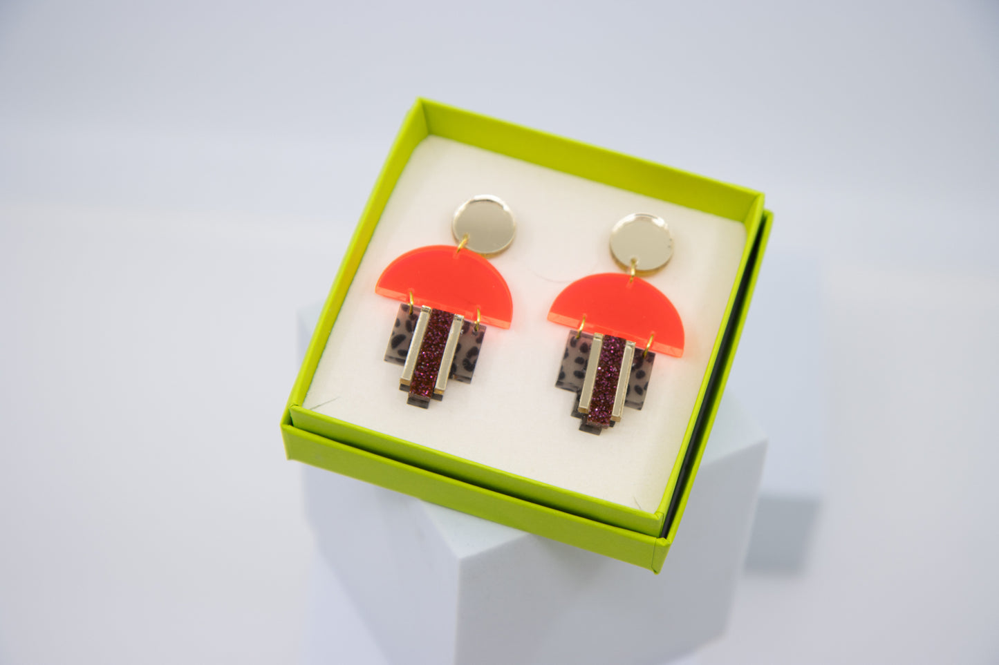 EMPIRE – Art Deco earrings in glitter green &amp; mirror orange