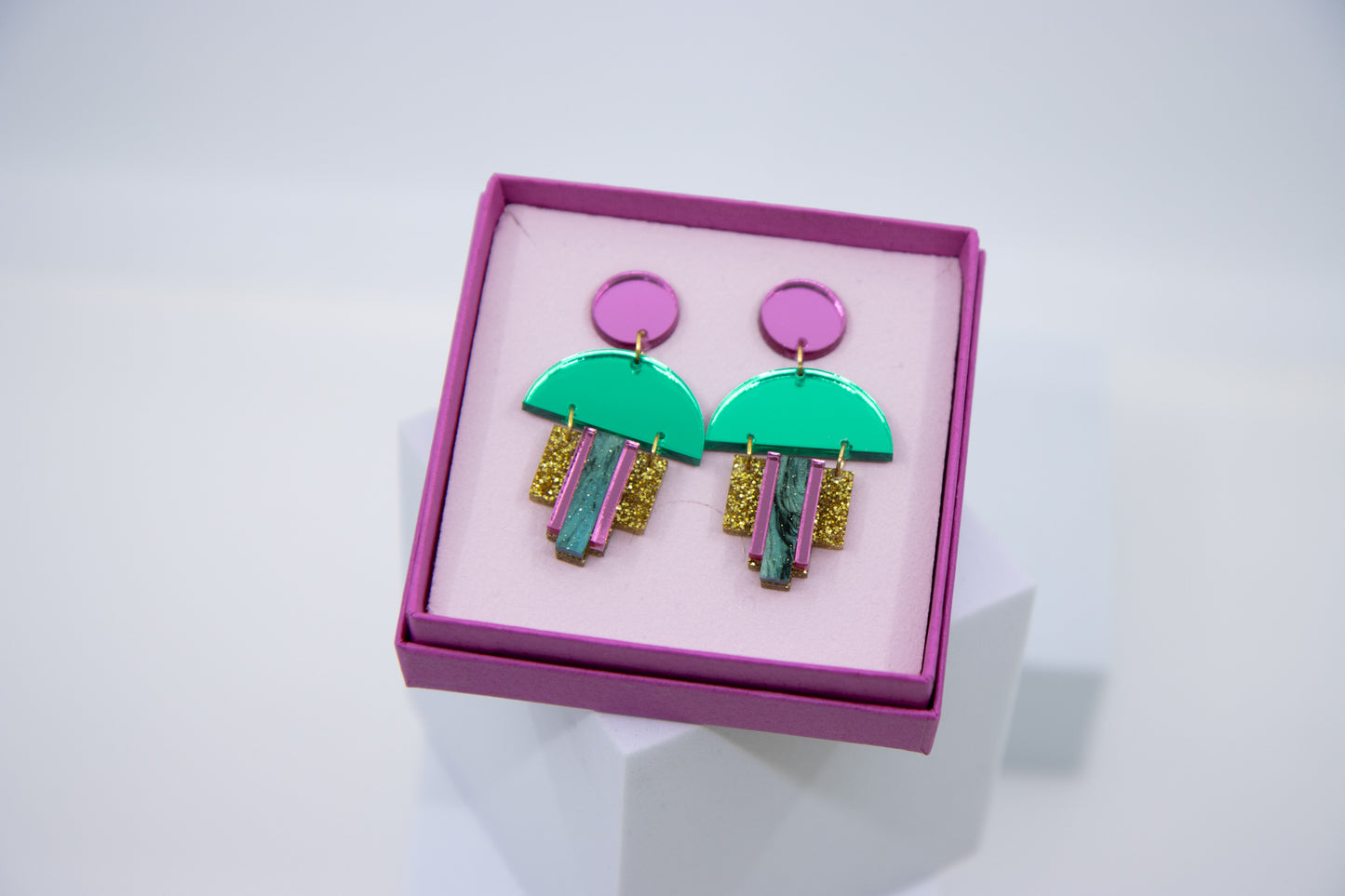 EMPIRE – Art Deco earrings in glitter green &amp; mirror orange